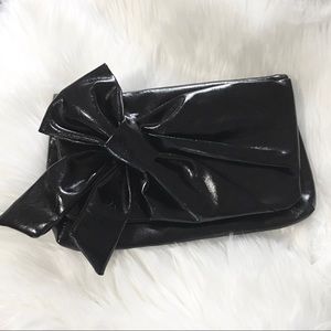 Black faux leather bow clutch